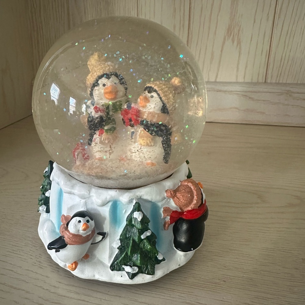 Festive Snow Globe with Penguins
